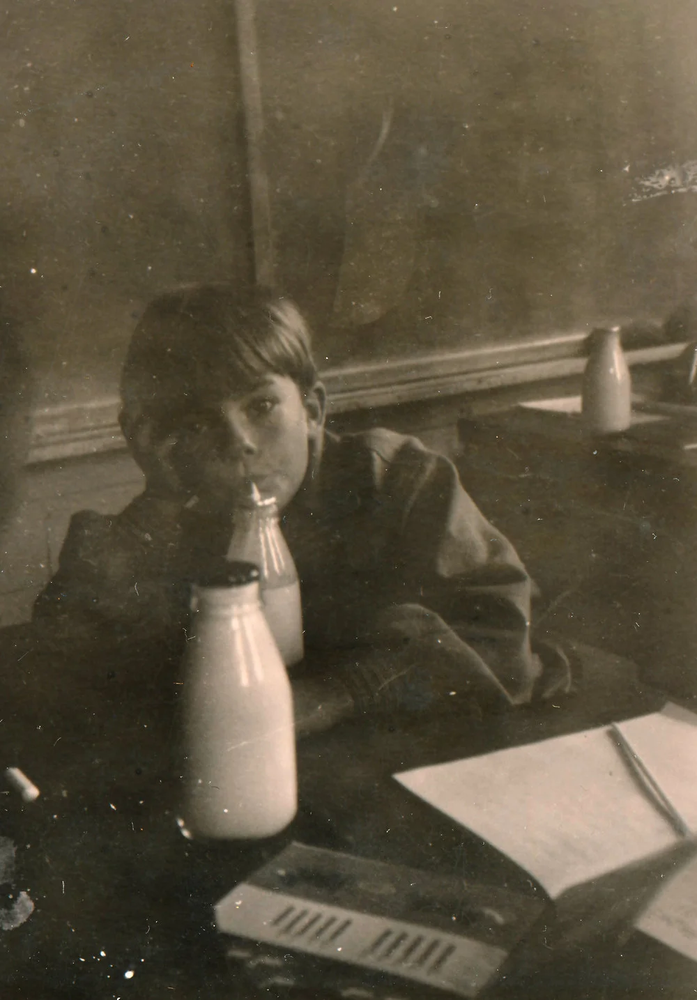 Te Marua School; boy drinking milk; circa 1955