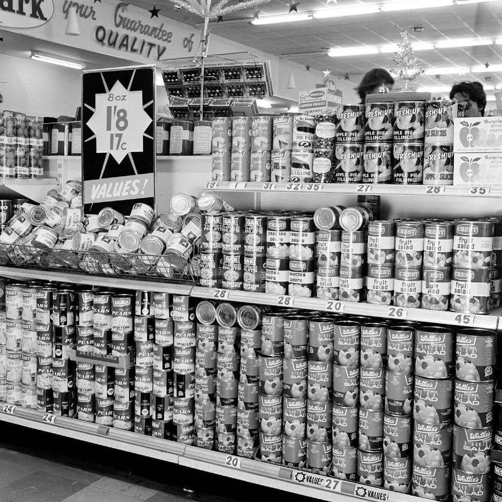 Woolworths display; tinned fruit. [P1-6389-8779]