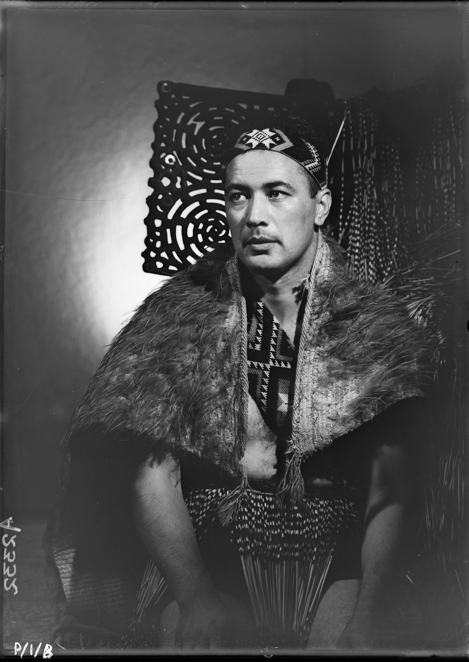 1/2 length portrait of Mr Paul Lew, a Maori announcer on 1ZB 1930