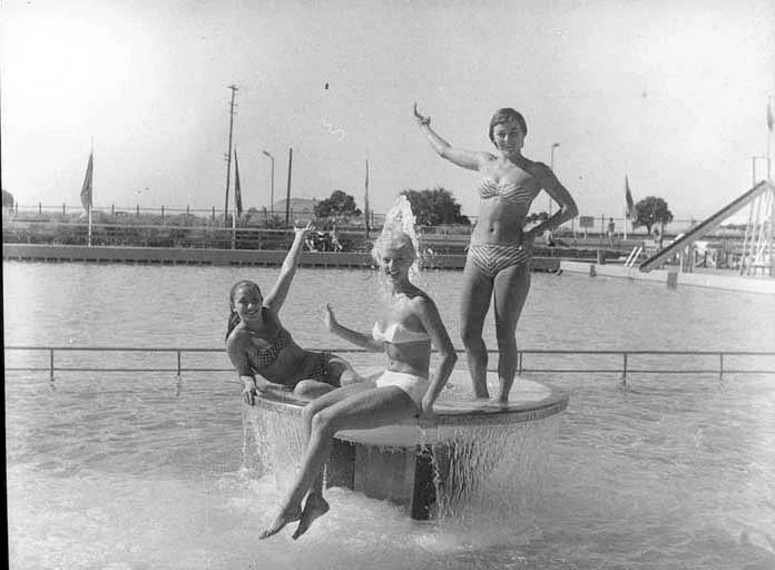 Full length portrait of poolside scene with the Aquabelles