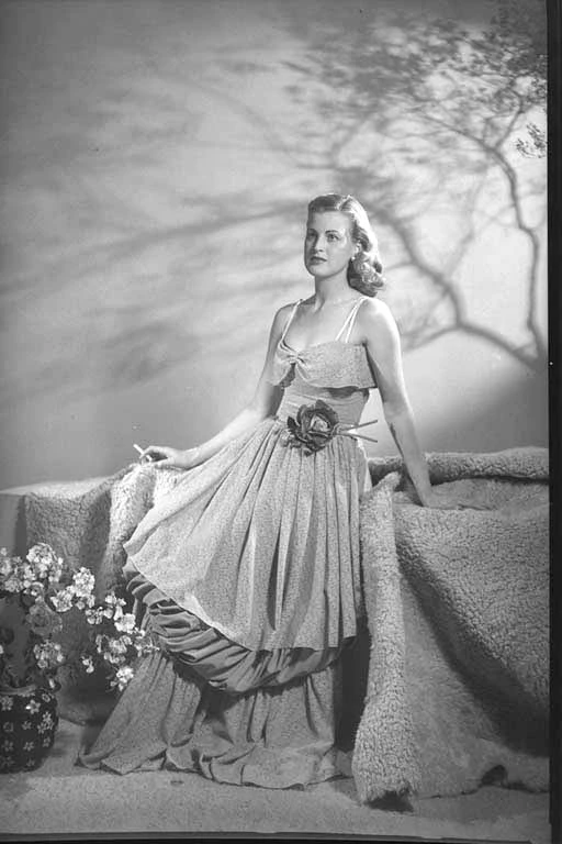 Portrait of Miss Rita Harvey wearing evening gown