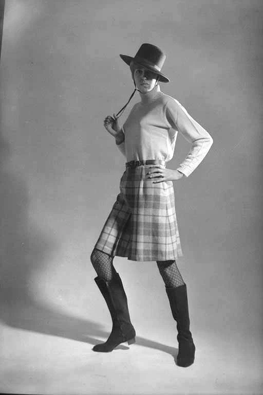 Full length portrait of Maureen Long, modelling fashion