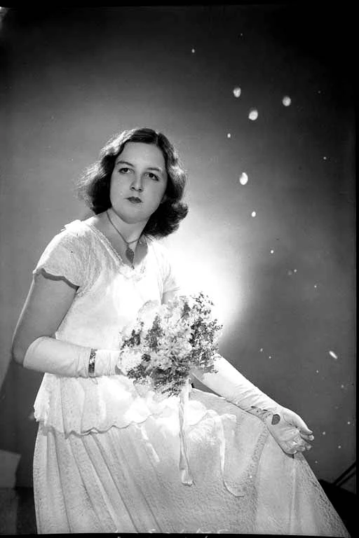 3/4 portrait of Miss Bernadette Sullivan as a debutante