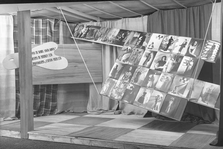 An advertising photograph display, models wearing Bobby Angus Gowns