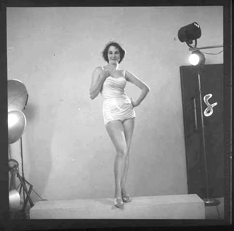 Full length portrait of Mrs Sweetman modelling bathing suit