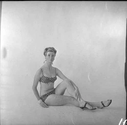 Full length portrait of Barbara Skokandich, modelling a bathing suit