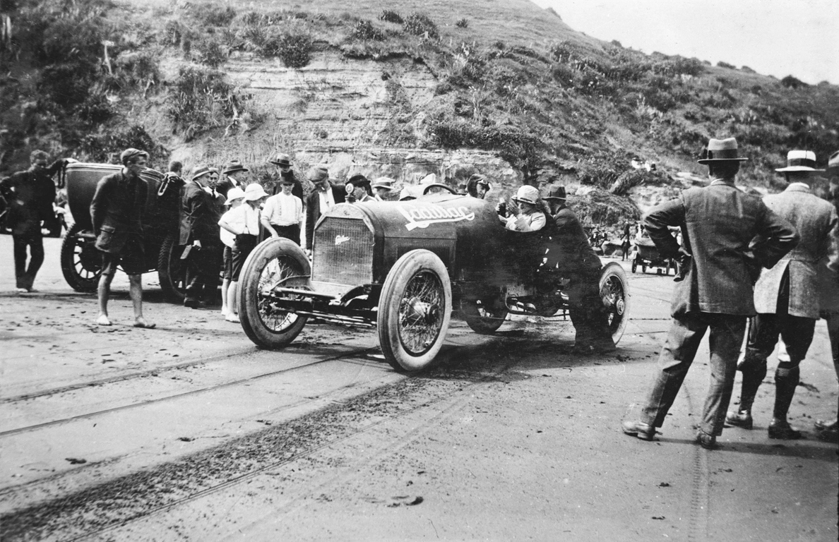 Howard Natrass and his Cadillac at Muriwai Beach