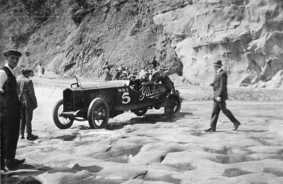Selwyn Craig's Packard MRS (Mountain Road Special) racing car at Muriwai beach, 1922
