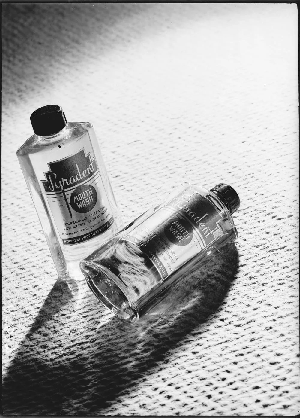 Two bottles of Pyradent mouthwash for Dormer Beck Advertising 1940s