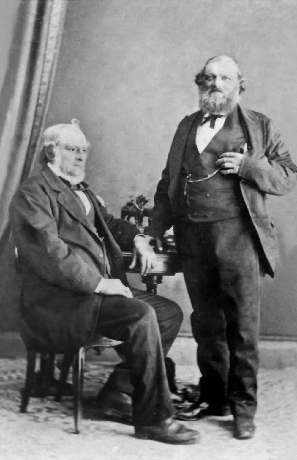 Portrait of Captain John William Grundy (standing) and his...
