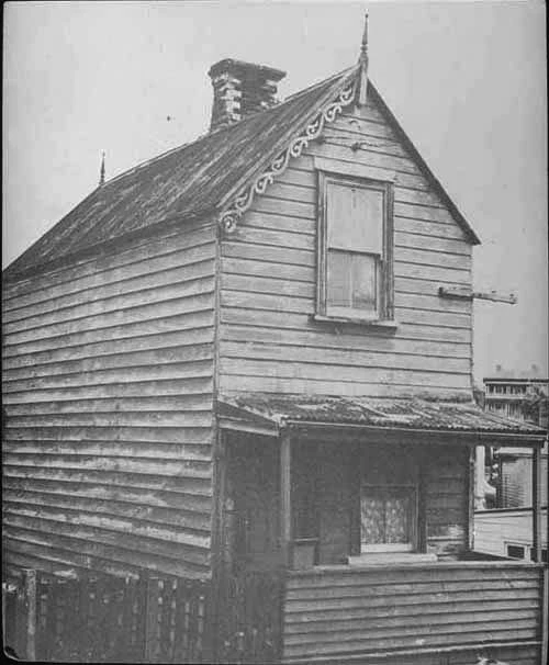 Showing the narrow weatherboard home of the Beaney family,....