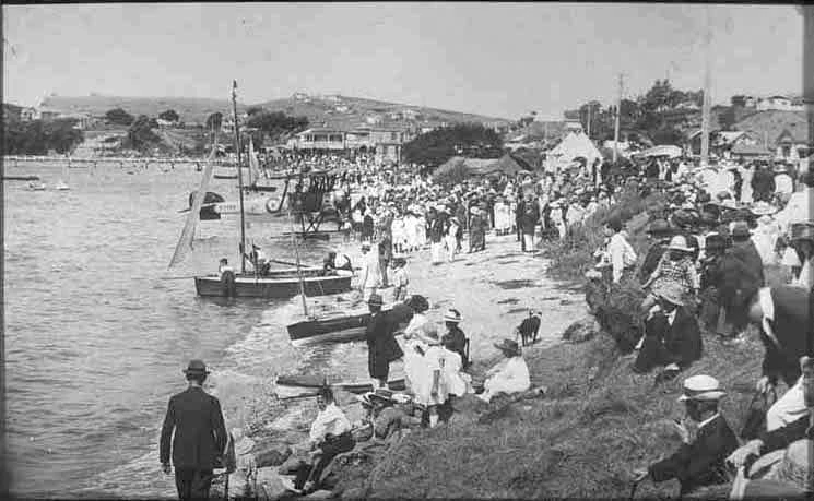 Looking east along St Heliers Bay beach, showing the St Heliers....