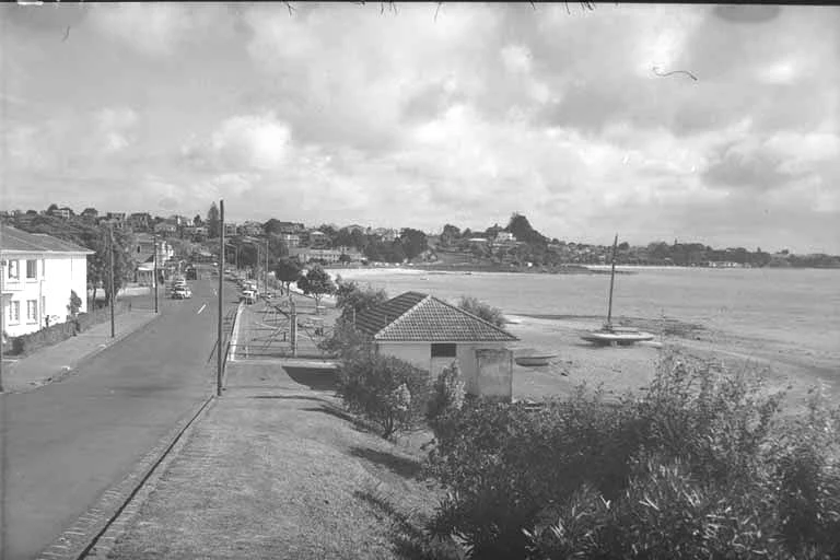 Looking west across St Heliers Bay showing Tamaki Drive (left),....