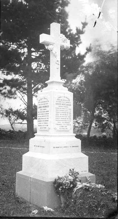 Showing the grave and tombstone of...