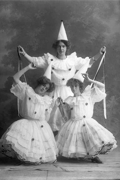 Full length portrait of three woman from the Sixes and Sevens....