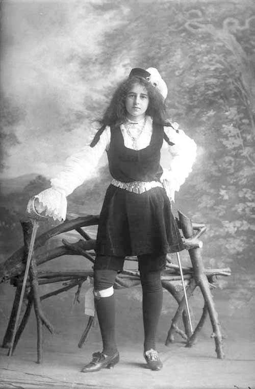 Miss A Leeds in cavalier?costume 1910