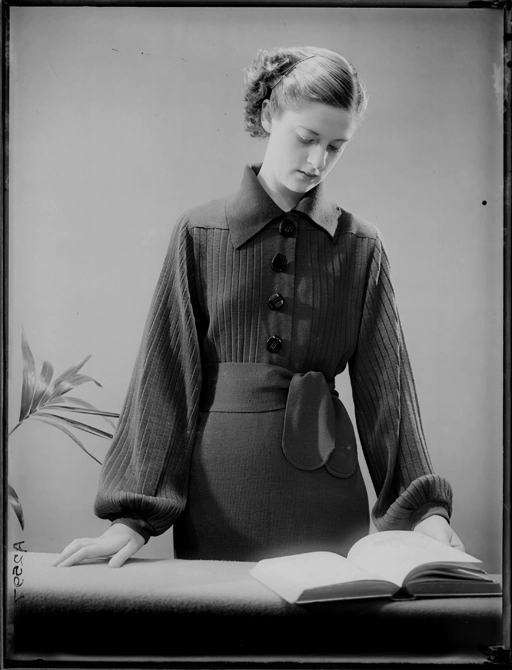 Full length portrait of a model for New Zealand Knitted Wear 1940s