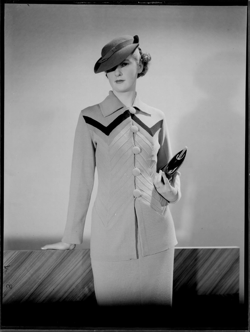 Full length portrait of a model for New Zealand Knitted Wear 1940s