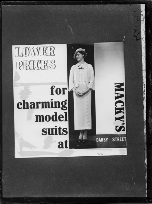 Showing a poster advertising Mackys, for Macky Logan Limited 1940s