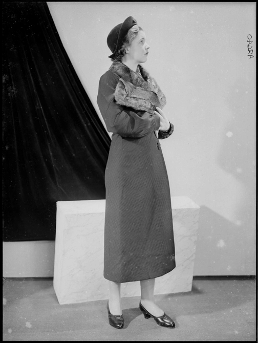 Full length portrait of a model for Ross and Glendenning Limited 1940s