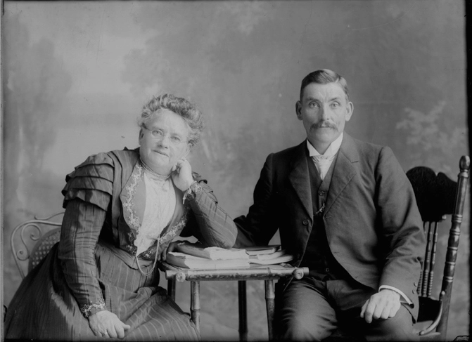 3/4 length family portrait of a man and a woman in the Snell....