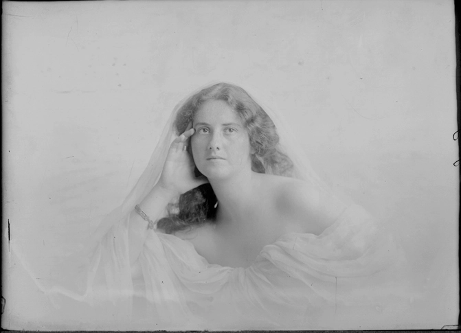 1/4 length portrait of Miss Tingey with bare shoulders and....