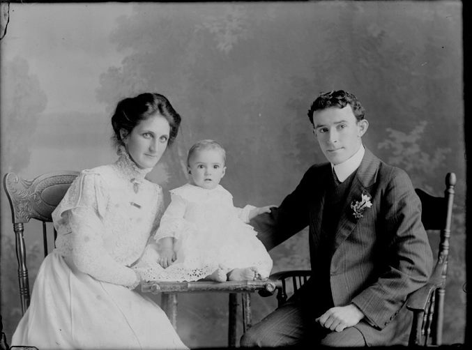 3/4 length portrait of the Dillon family, the man and woman....