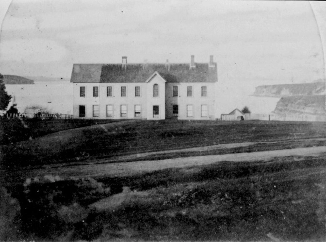 Looking north from the site of the Supreme Court showing Parliament Building later used by the Auckland Provincial Council, 1861