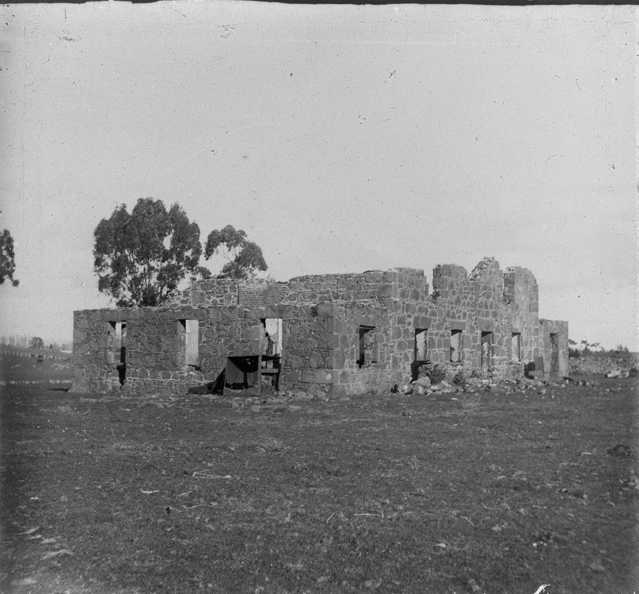 Ruins of stone building in Pah Road, 1900s