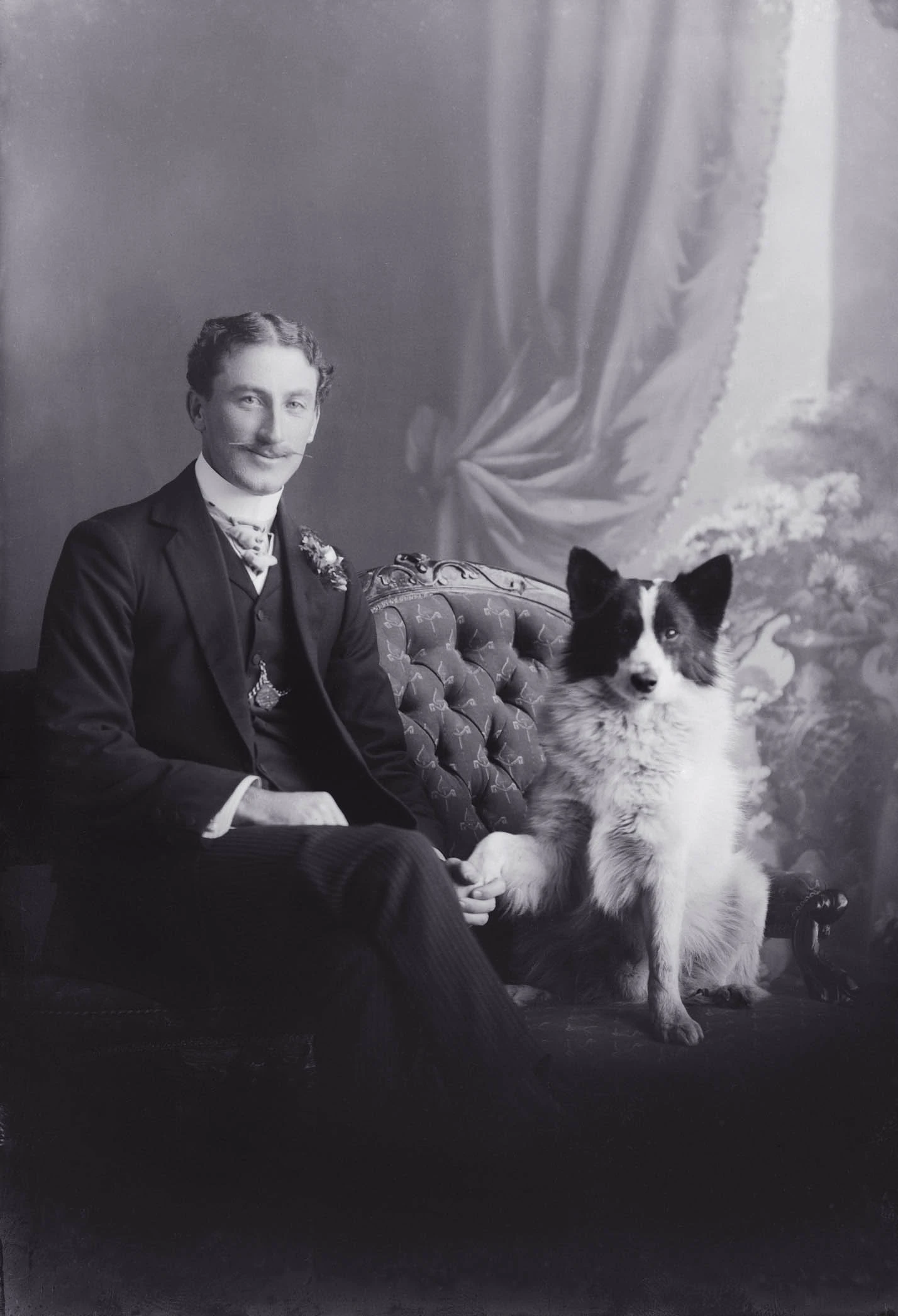 3/4 length portrait of Mr Raynes seated, with a large moustache....