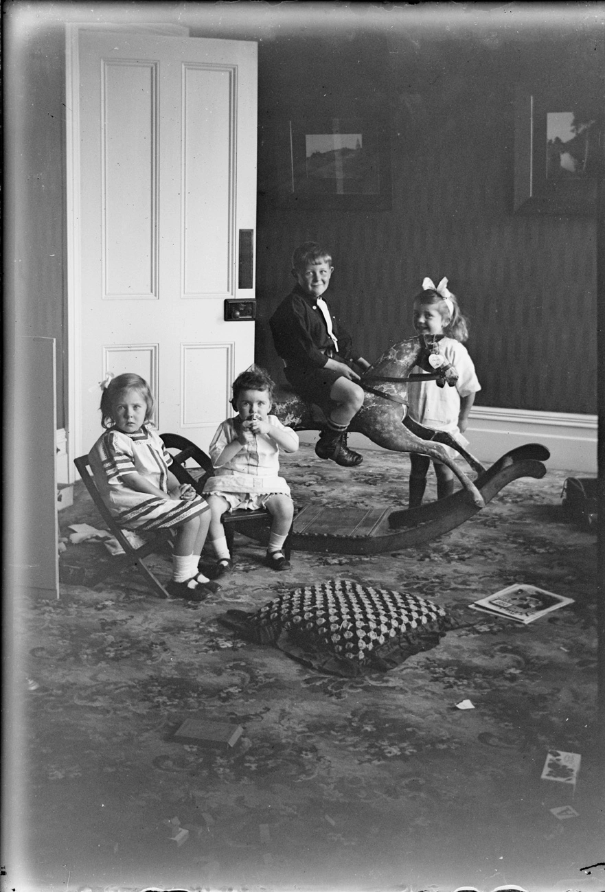 Children and rocking horse