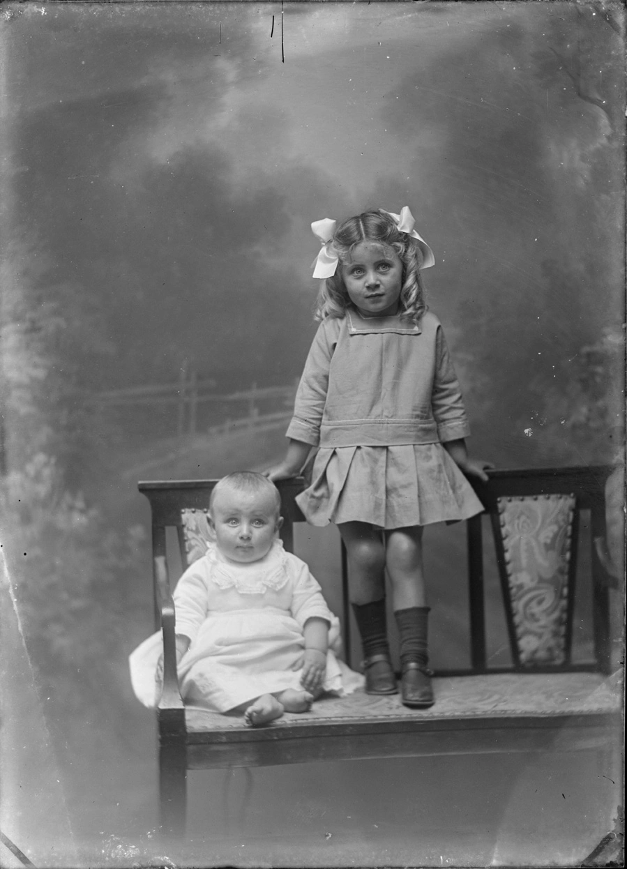 Unidentified baby and girl...