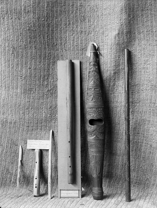 Flutes used by Maori, and a bone spear barb