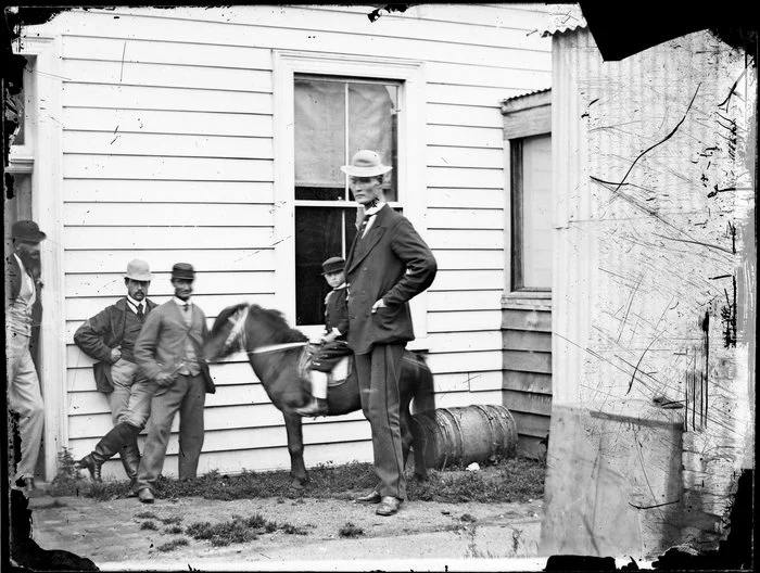 Alfred Walker on Shetland pony Tom Thumb, with brother John Walker and unidentified circus performers