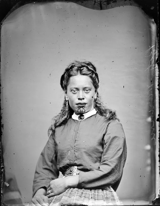 Unidentified young Maori woman with clear chin moko