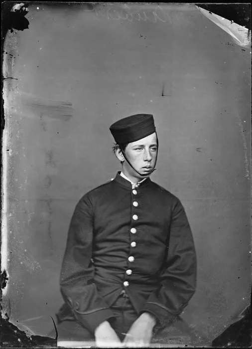 Unidentified young man (Mr Aubert?) in military uniform, with cap