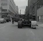 Unloading bulldozer, Bay Street Depot, William Henry Street Ultimo, 1961
