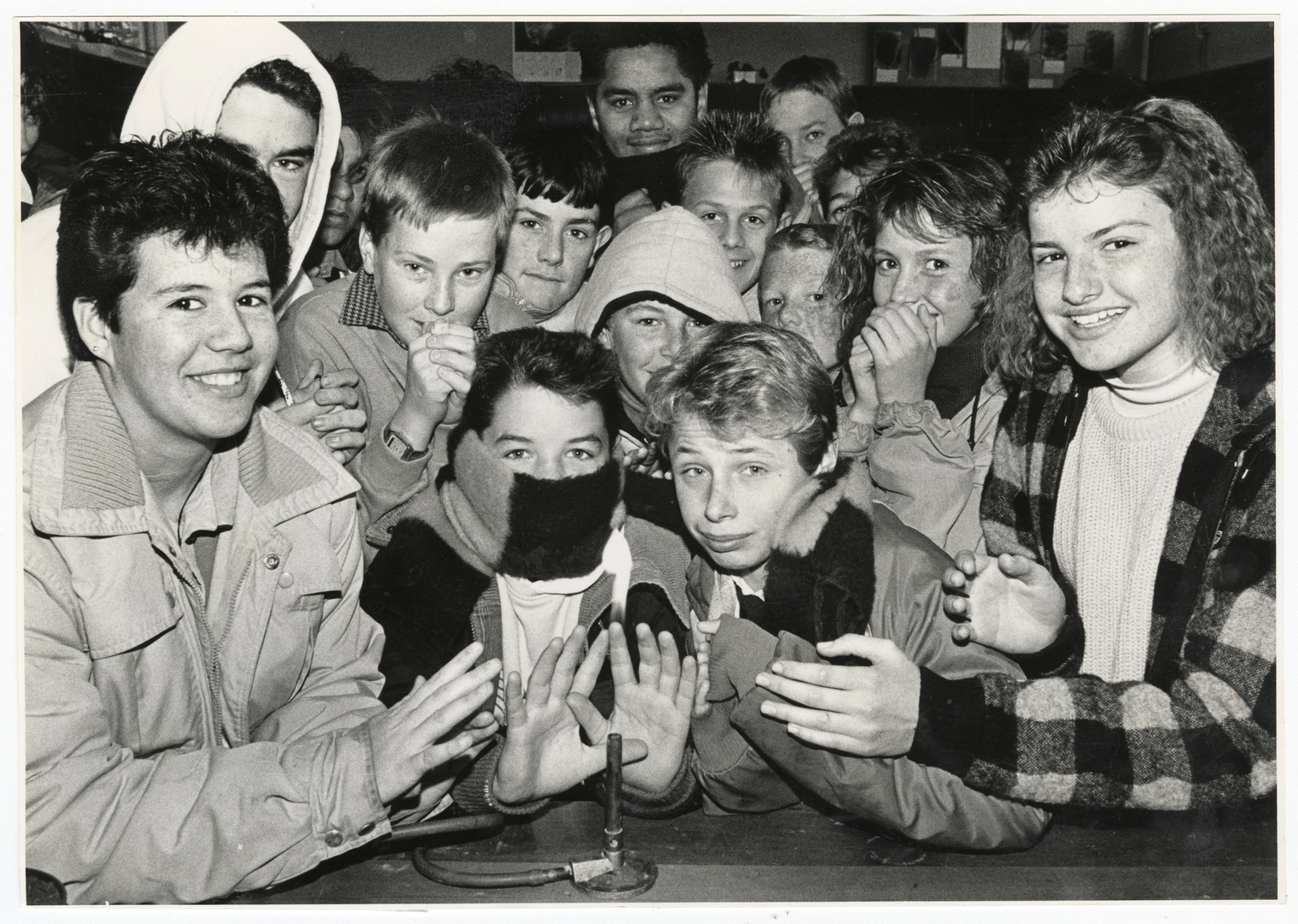 Hillmorton High School students around a bunsen burner
