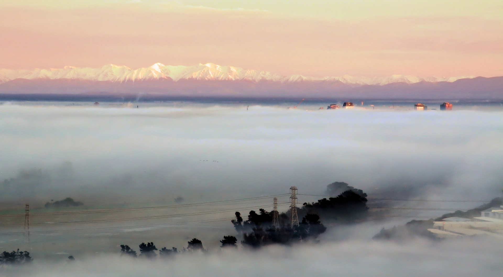 The Southern Alps and Christchurch city skyline