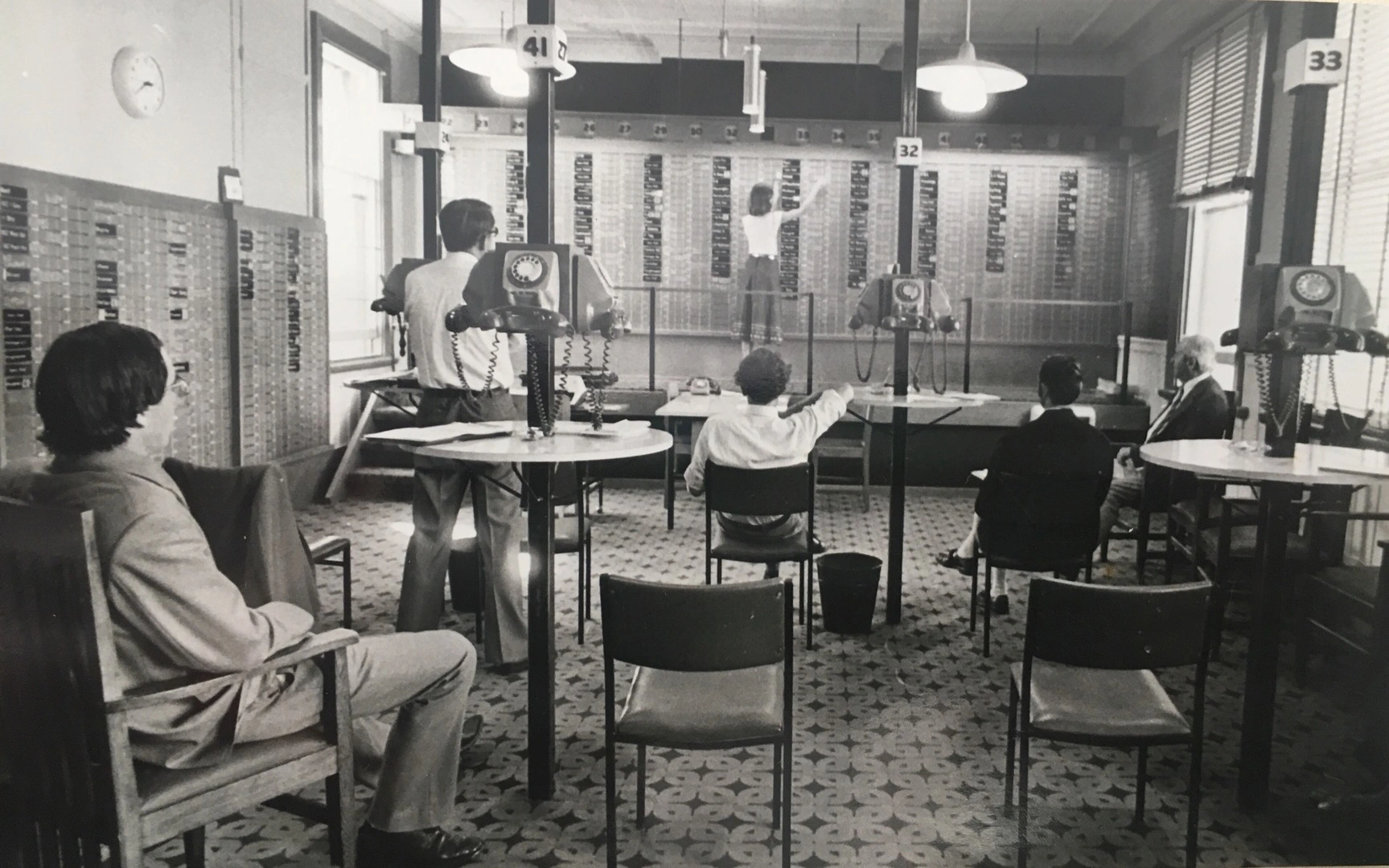 Kathryn Drury working at the Christchurch stock exchange on Oxford Terrace