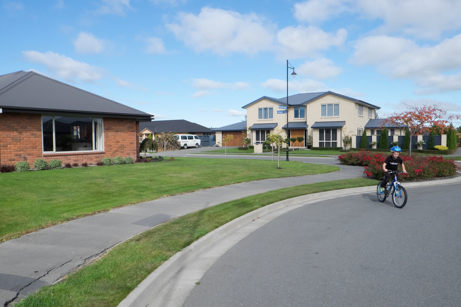 Child rides bike around Aidanfield subdivision, Halswell