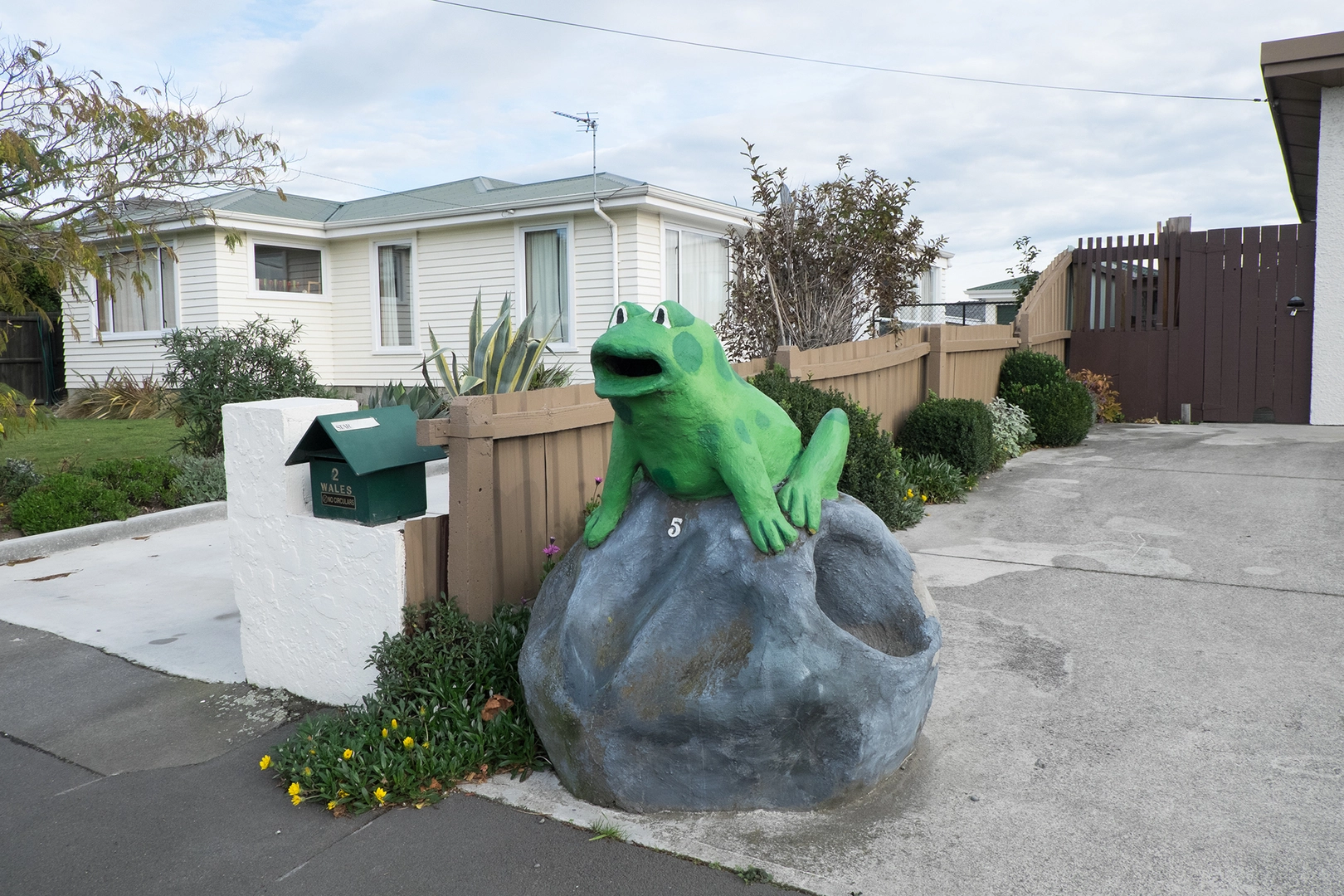 Frog mail box outside a house in Halswell