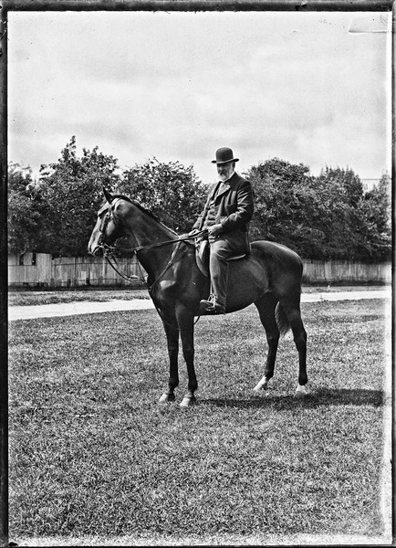 Man riding a horse in Hagley Park