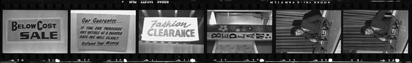 Les Stott, Petticoat Lane promoter, and sale signage 