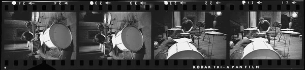 Percussionist Gary Brain setting up instruments 