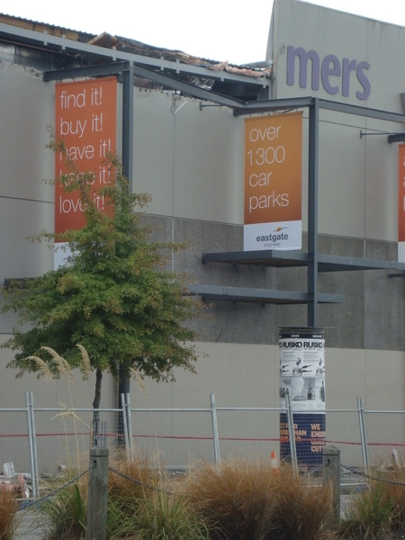 Damaged Farmers wall at Eastgate Mall