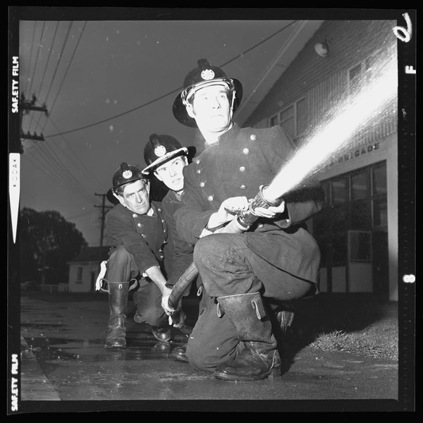 Lincoln Volunteer Fire Brigade with fire hose
