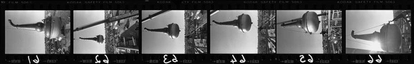 A crane moving a Southern Grain Spirits gin still