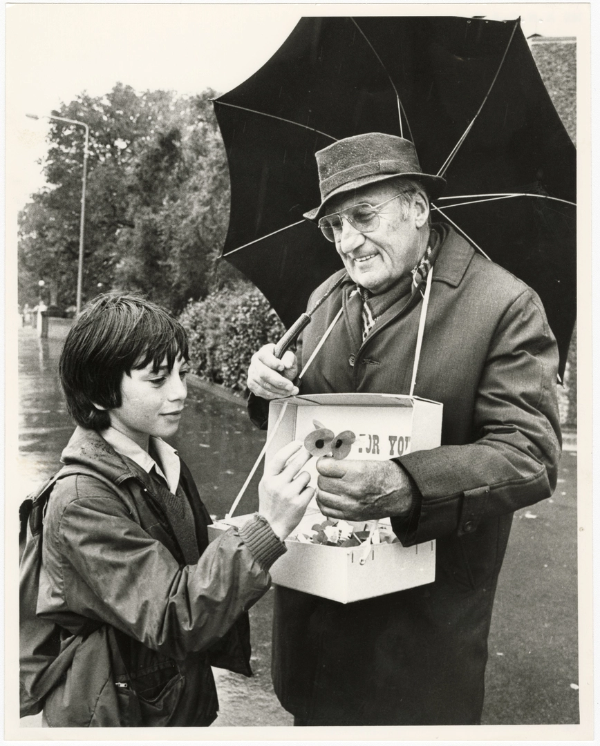 Selling poppies in the rain