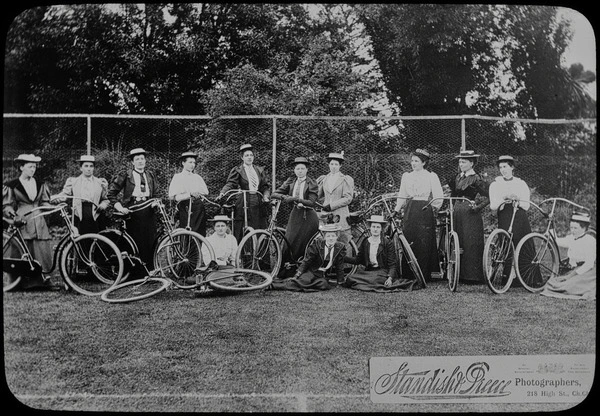 Fourteen unidentified women with bicycles